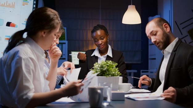 A diverse team of finance professionals working together in a well-lit office, symbolizing collaboration and preparation for the upcoming VAT regulations deadline.