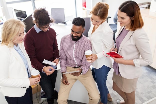 A diverse group of people attending a job fair, reviewing job postings, and engaging in conversations with potential employers.
