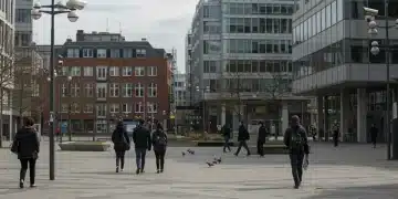 People in a city square under surveillance, illustrating public privacy